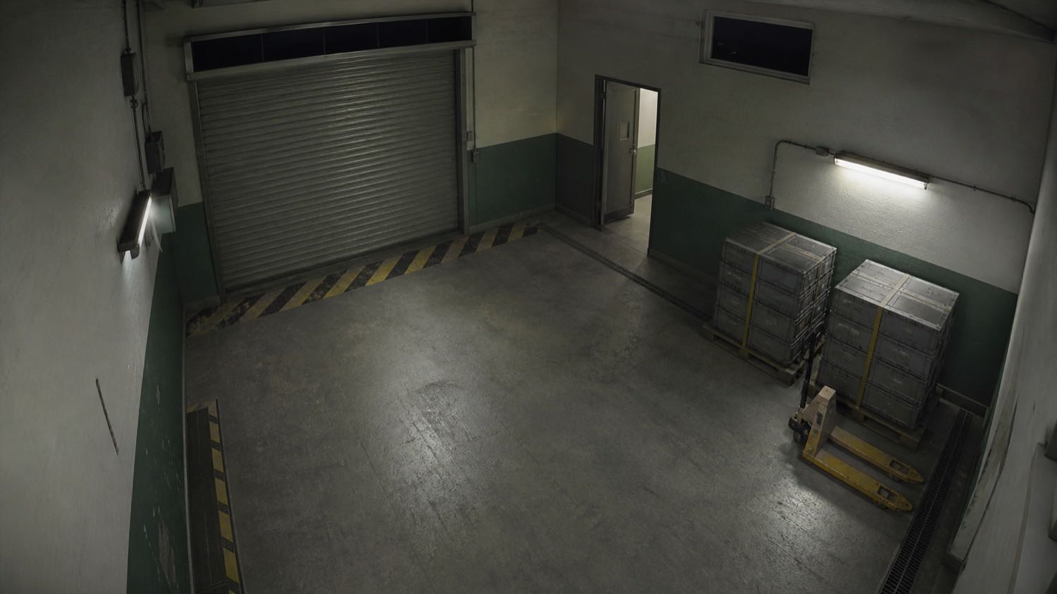 A loading bay stacked with crates under a security camera